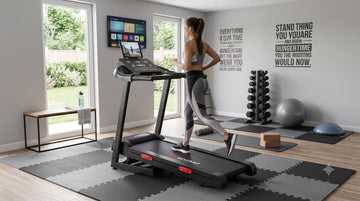 Wenoker X-T421 folding treadmill in a modern home gym designed for everyday cardio workouts.